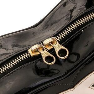 CHANEL Black Cosmetic Bag with Glossy Patent Leather and Gold Zipper